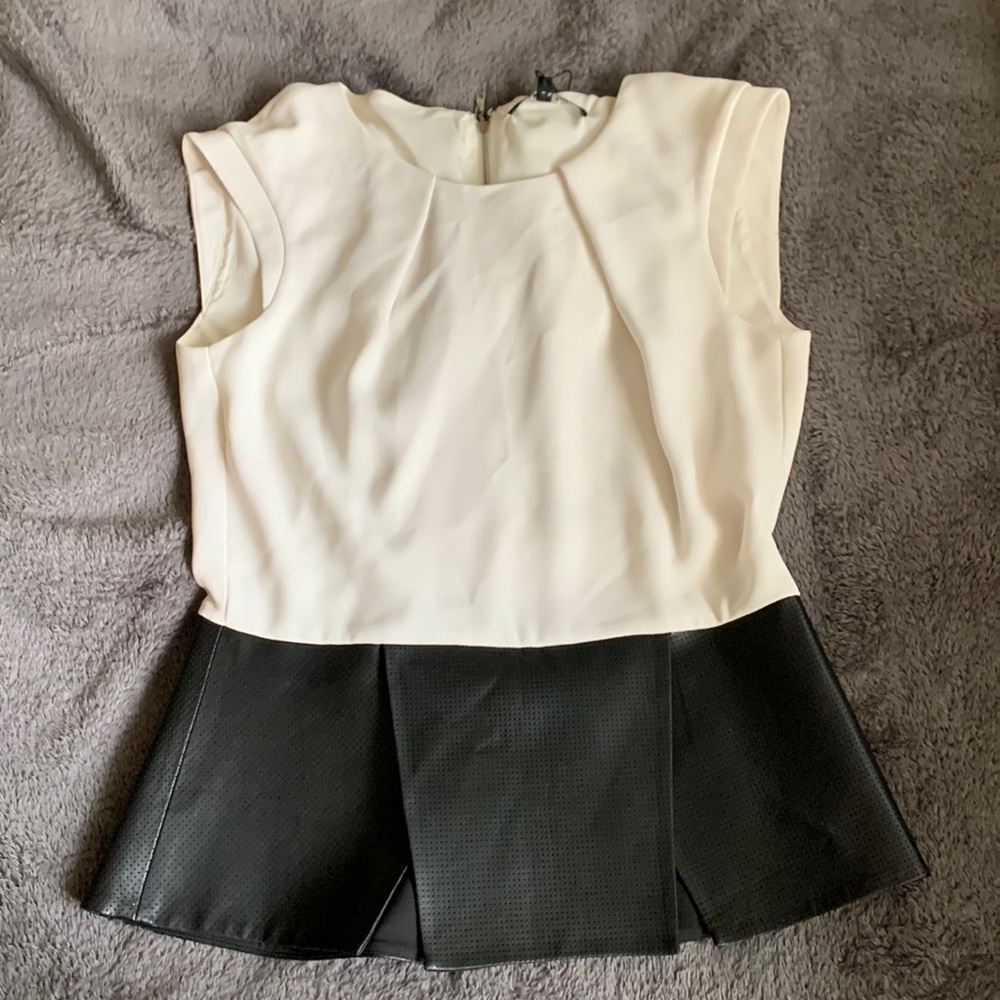 Brand new Rachel Roy size medium white top with black leather peplum , has tags